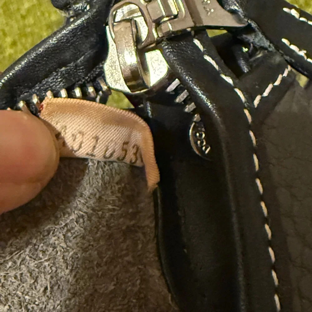 Dooney and Bourke Large Hobo in gray with black trim